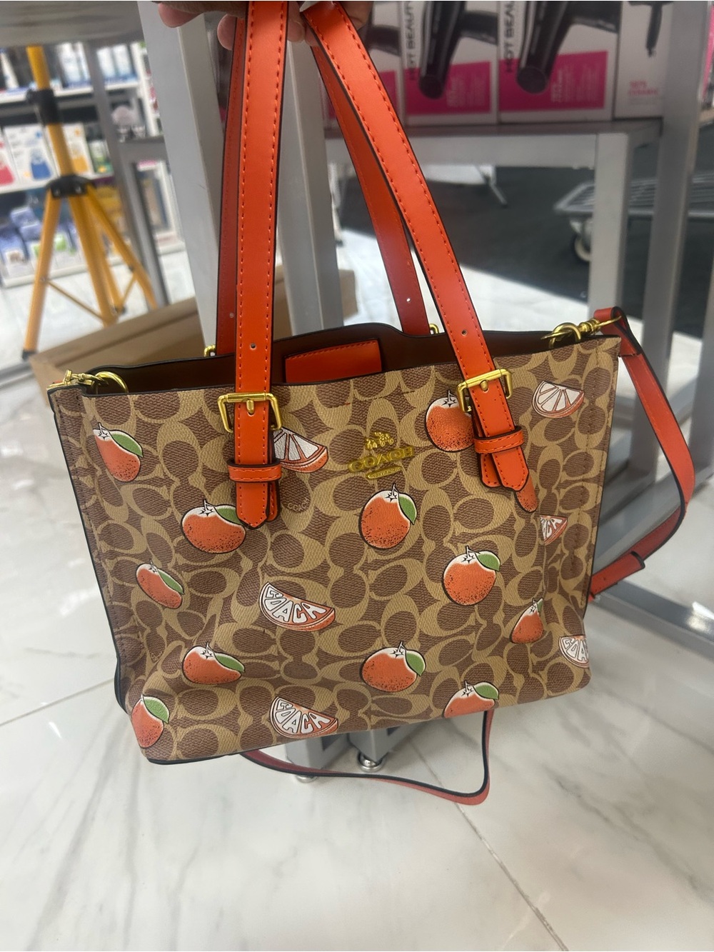 Coach Brown Signature Tote with Orange Fruit Print and Orange Straps
